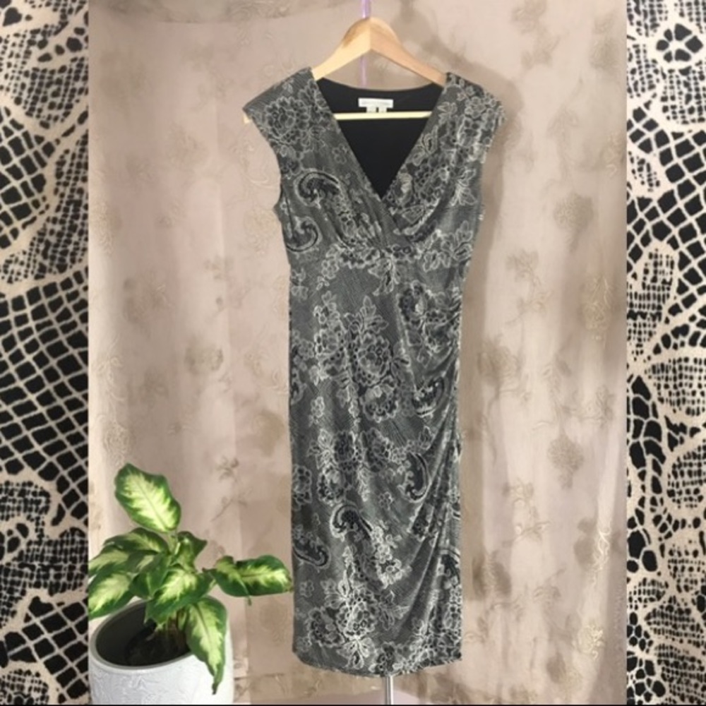 Beautiful lace print faux wrap dress!